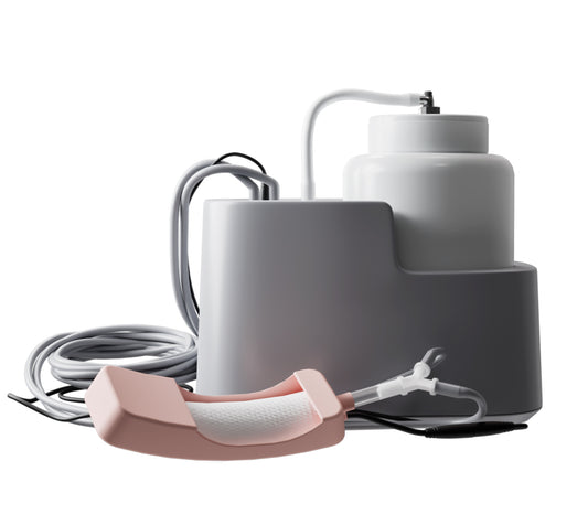 Urinary incontinence device with pink applicator and gray base unit for home use